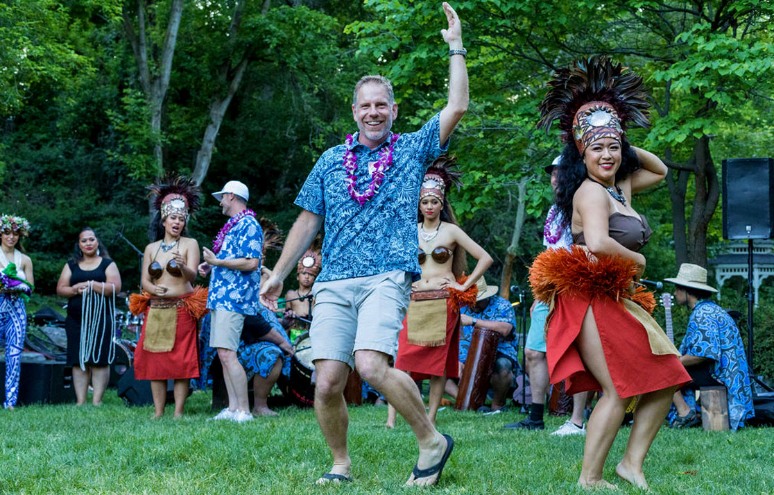 Chapter president cutting a rug at Luau New Year kick off event